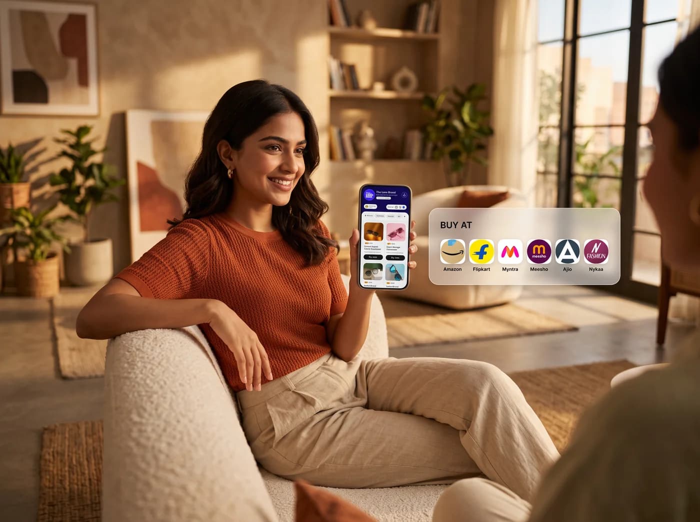 A shopper on her sofa browsing a Selectvia catalogue, with buttons to buy on Amazon, eBay, Flipkart and more